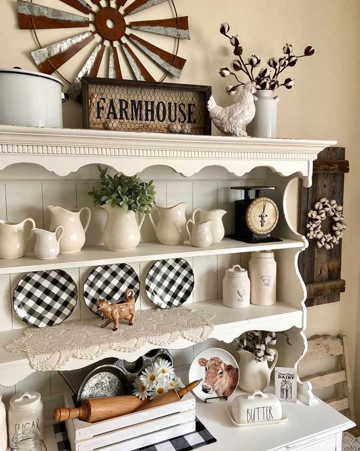 kitchen cabinet with open shelving and buffalo plate decor