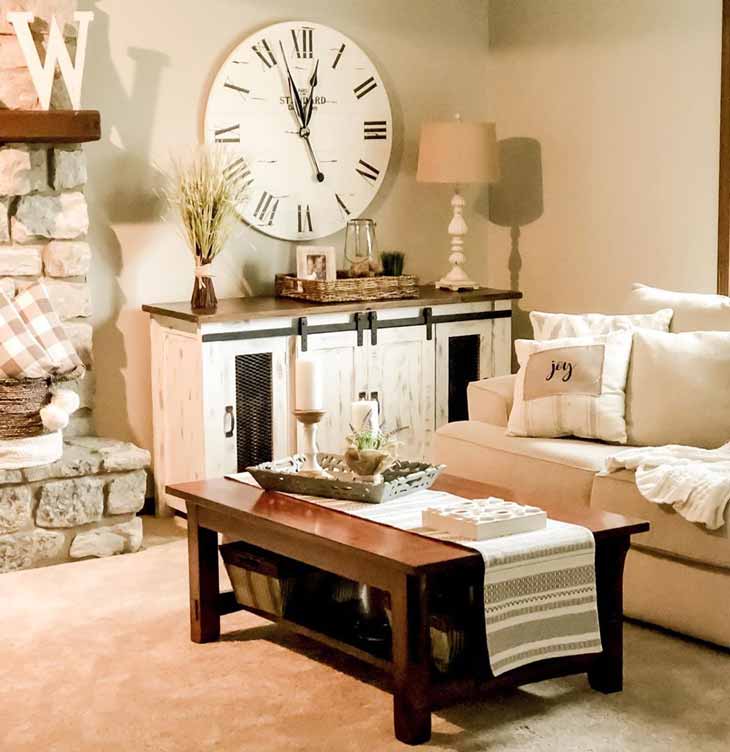 wood coffee table and big white farmhouse wall clock