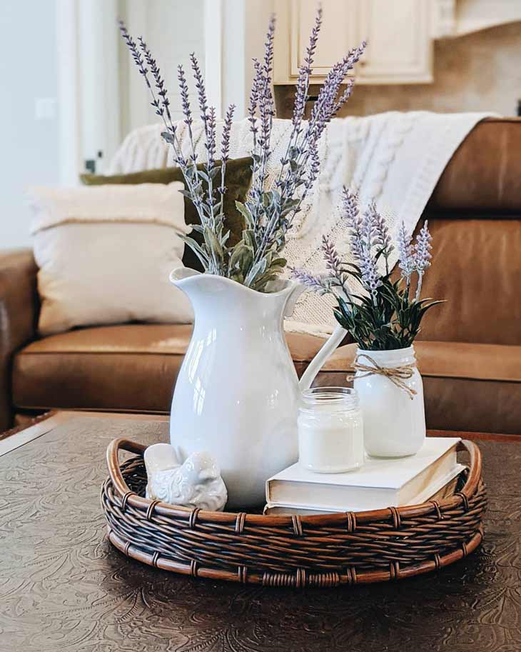 coffee table decor with basket tray, white pitcher and lavender