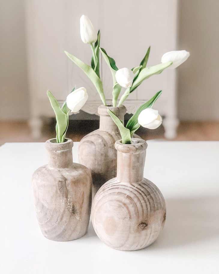 coffee table decor with wooden vases and artificial white tulips