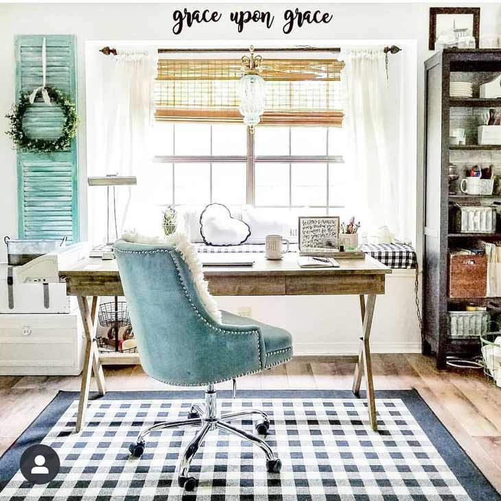 home office with teal chair and grey  wood desk