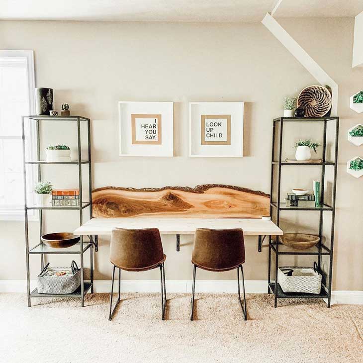 symmetric modern home office with two chairs and freestanding shelfs