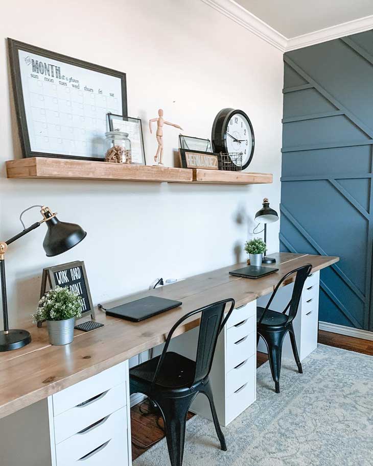 farmhouse home office with Ikea cabinets and black chairs