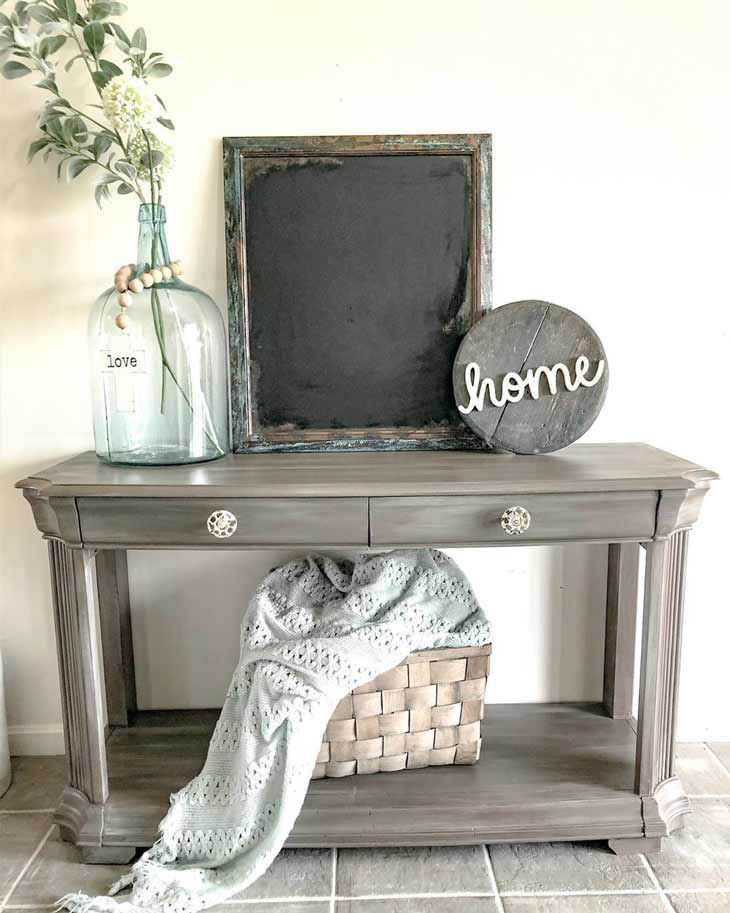 Entryway table with rustic decor