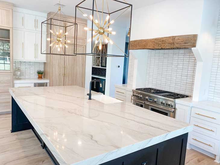 modern pendant lighting over white marble countertop