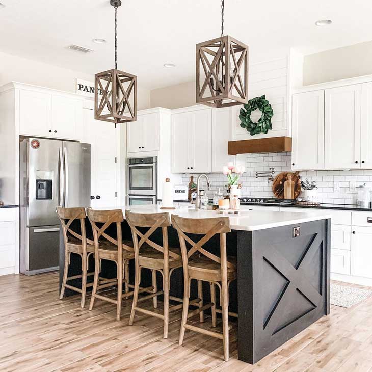 square wood pendant lighting for black kitchen island with wood barstools in modern farmhouse kitchen