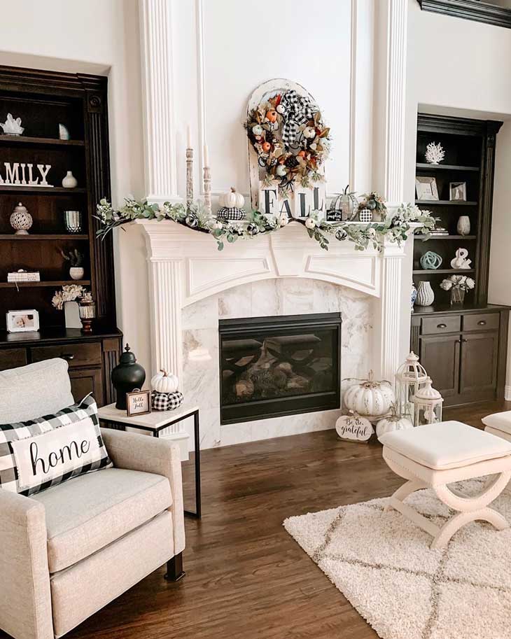 Modern farmhouse fireplace with fall decor