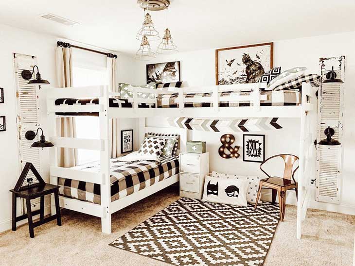 White bunk bed for three kids. black and white kids bedroom