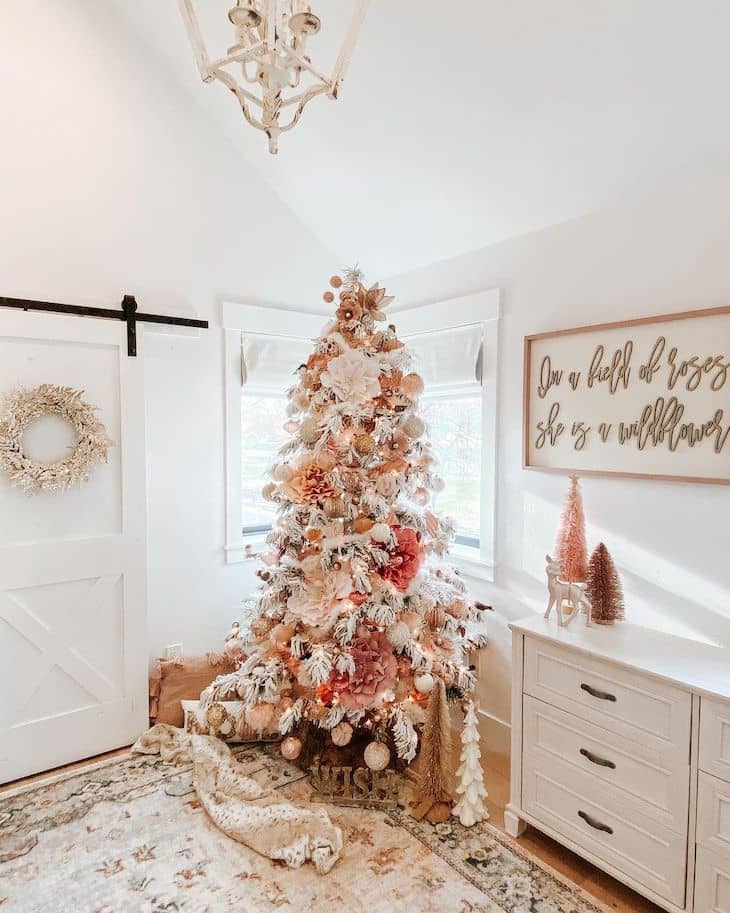 Peach and soft pink flocked Christmas tree for kids room