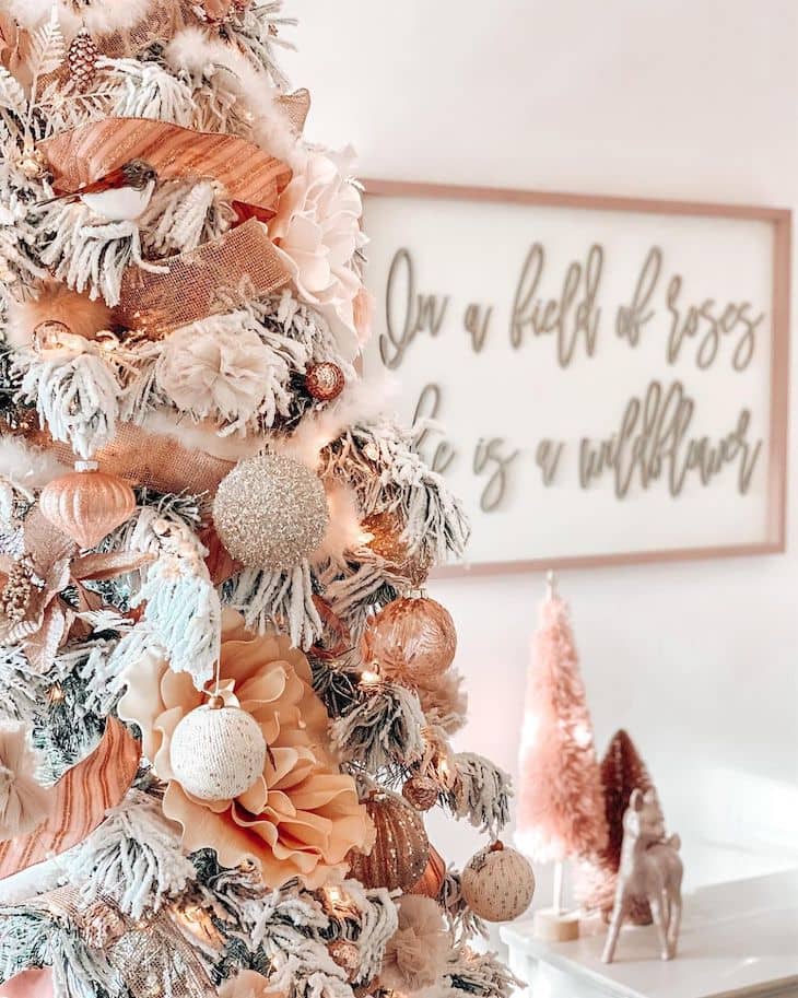 Peach and white ornaments on Christmas tree