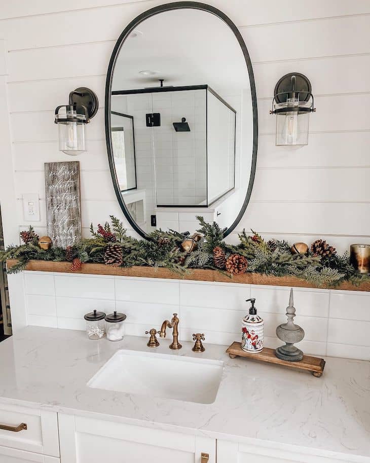 Garland with pinecone on bathroom mirror. 