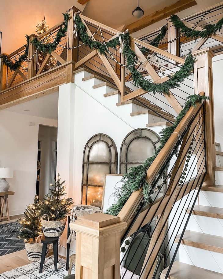 White oak staircase railings with modern farmhouse Christmas decor