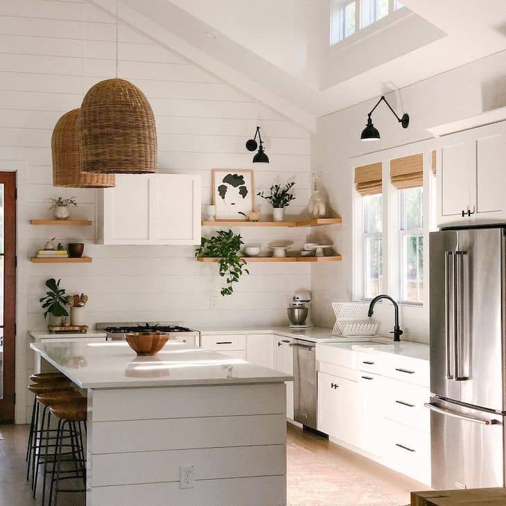 Farmhouse kitchen with corner shelves and shiplap backsplash