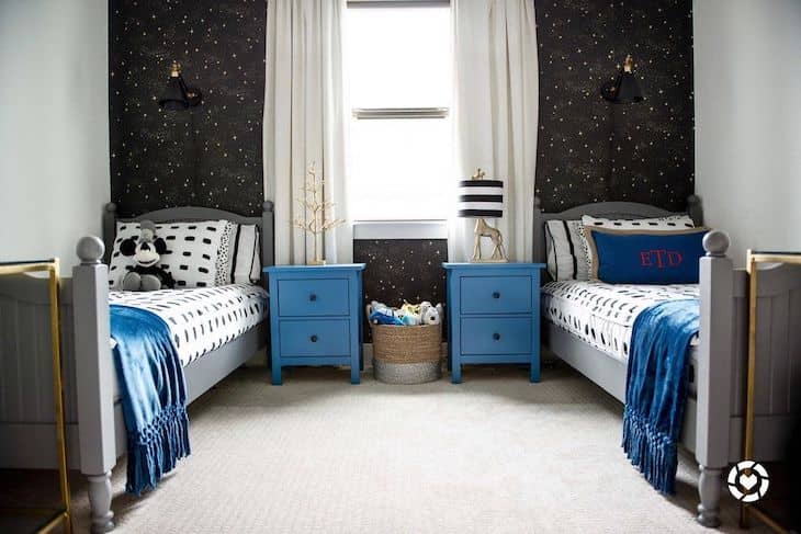 Shared kids room for boys with stars and blue accents