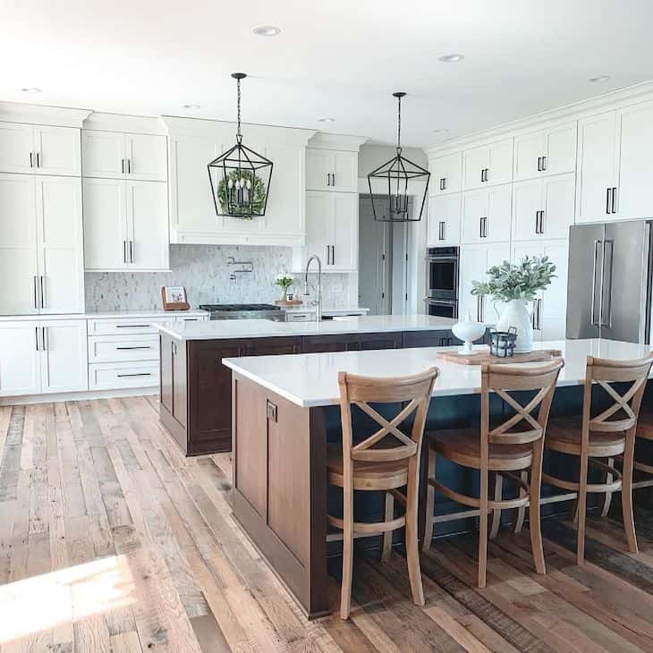 White and wood kitchen with double island