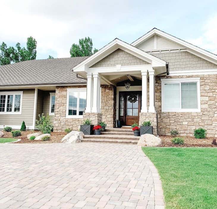 Modern farmhouse exterior with double posts on front porch