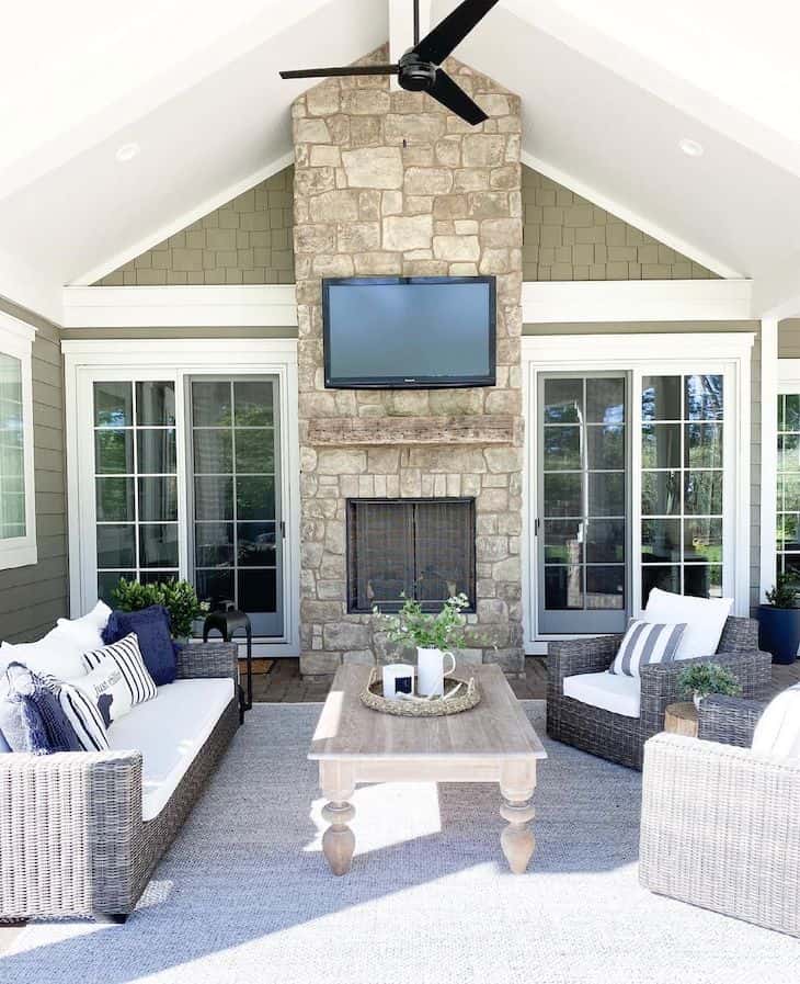 Patio with outdoor stone fireplace