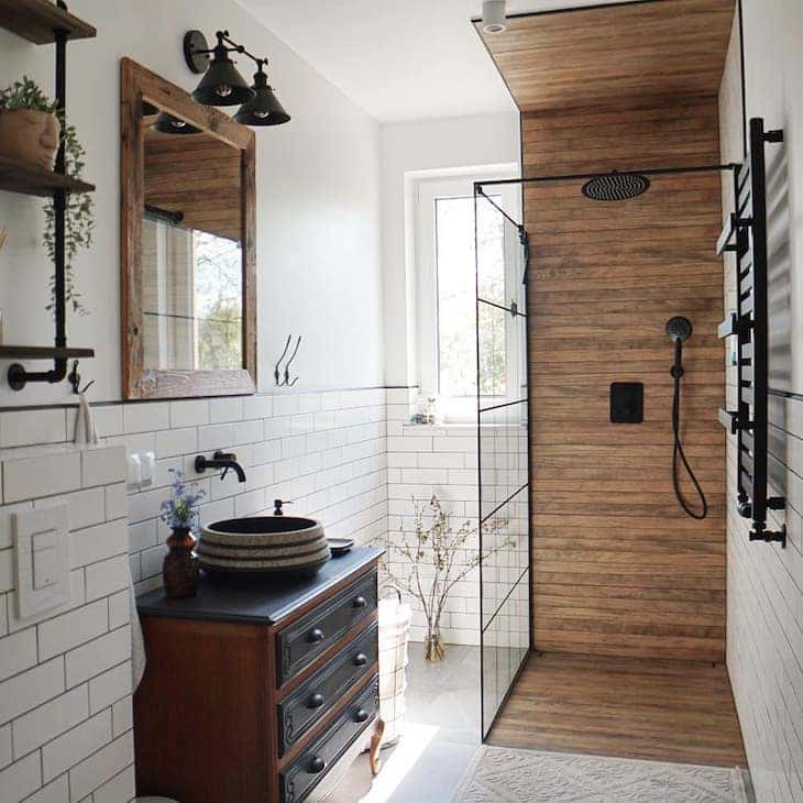 Wood looking shower tile in a rustic farmhouse bathroom