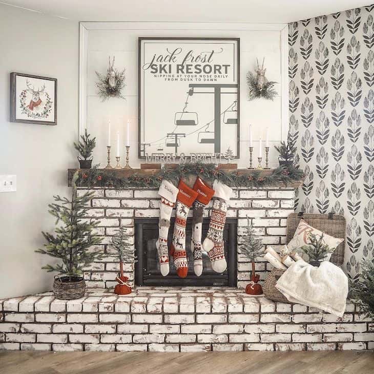 30. White brick fireplace with holiday decor