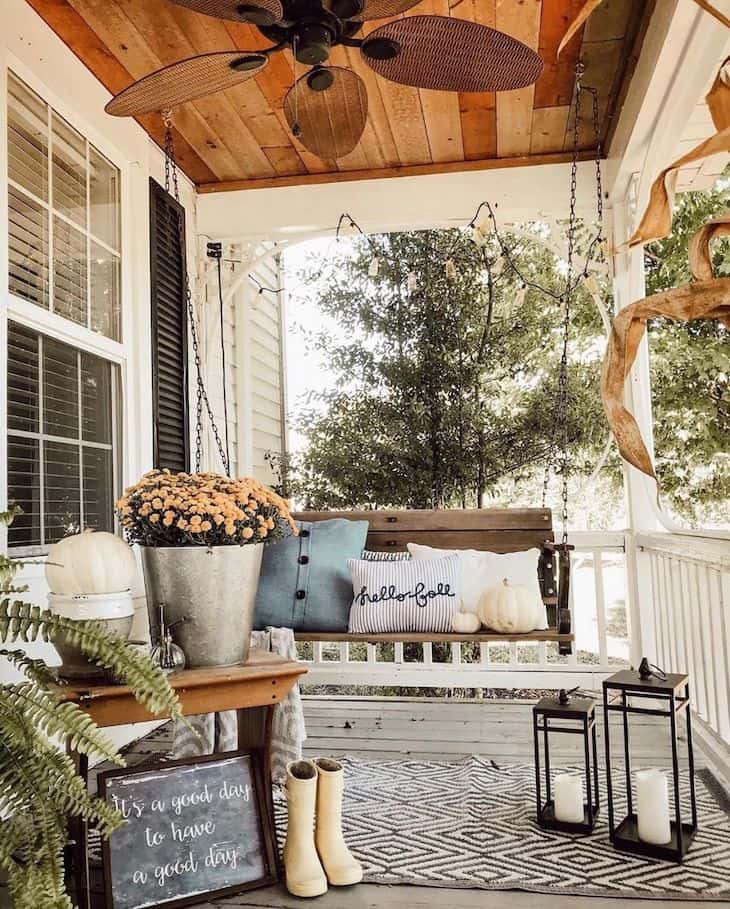 Fall decorated porch swing