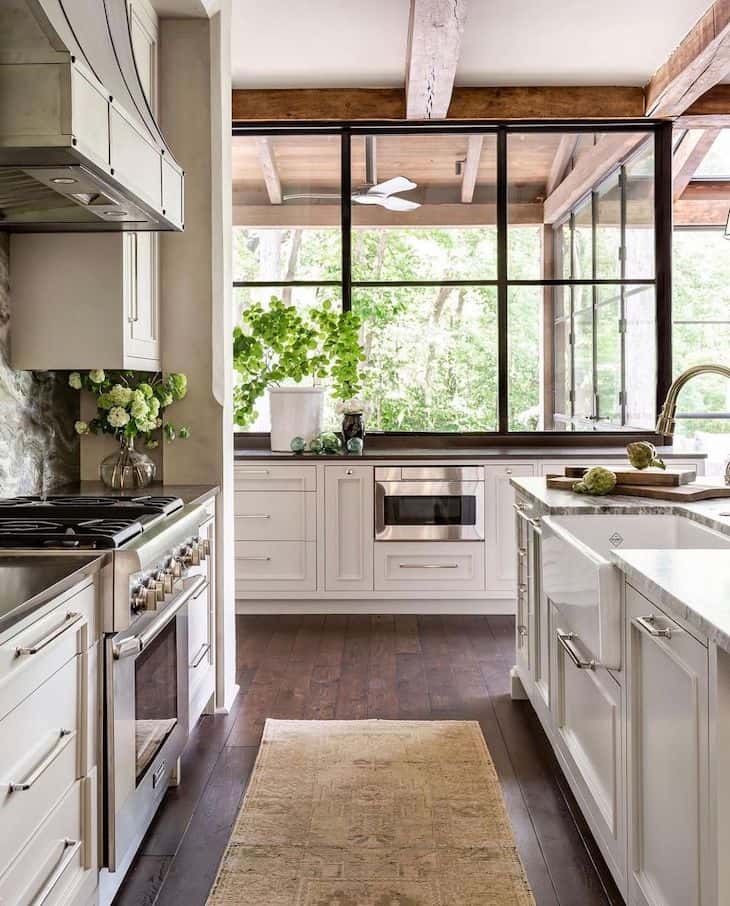 Black quartz countertops and white marble island countertop