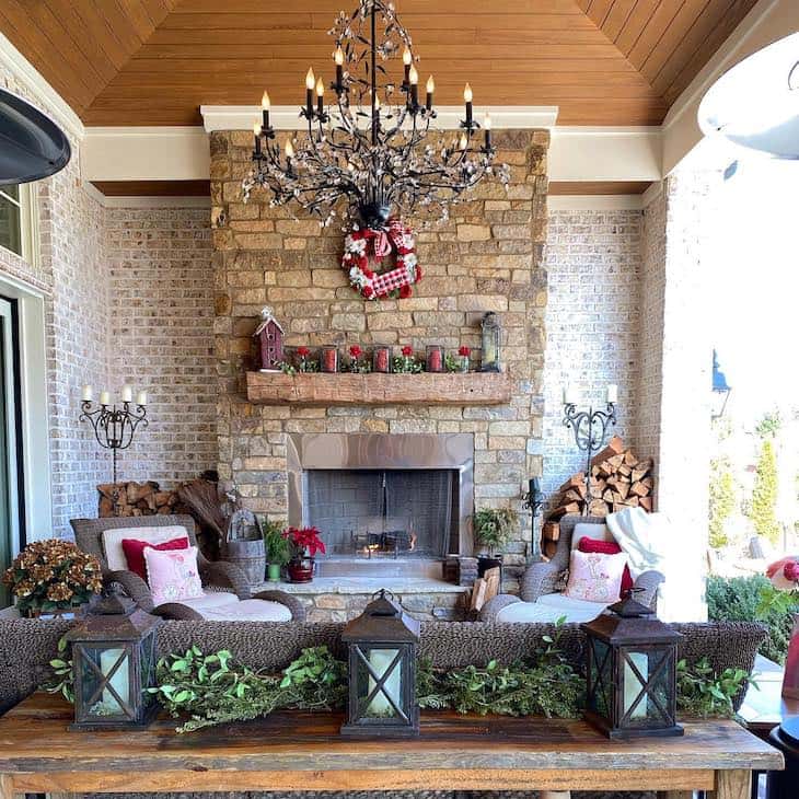 Outdoor living space with stone fireplace