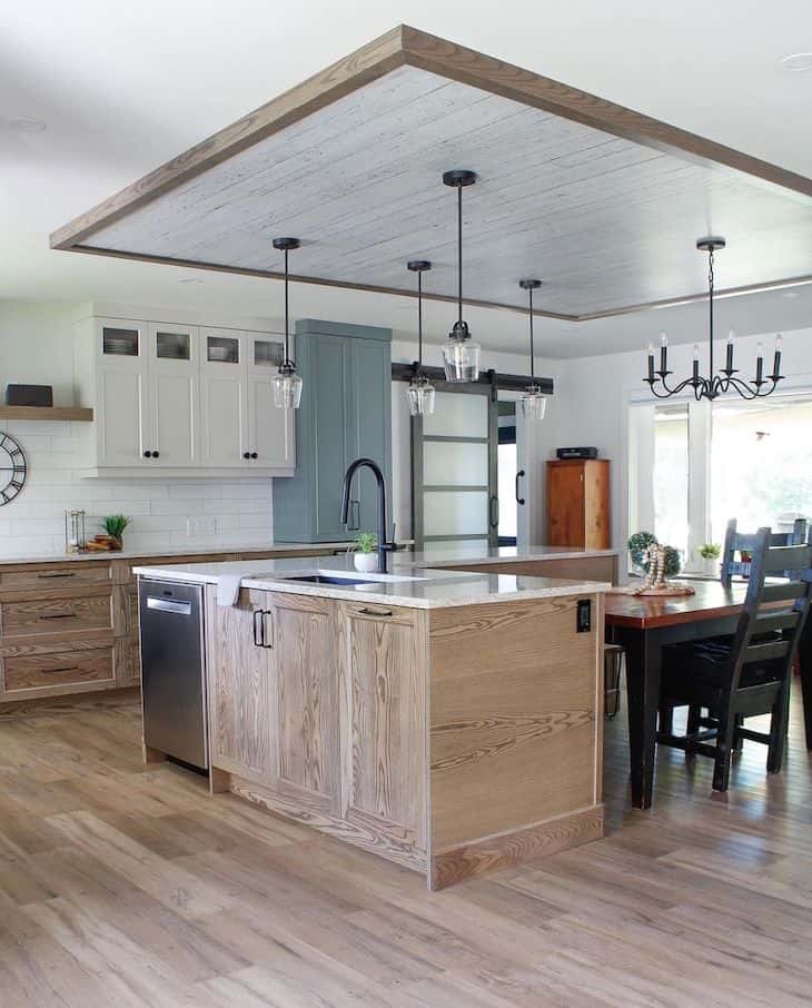 Grainy wood base kitchen cabinets and white upper cabinets