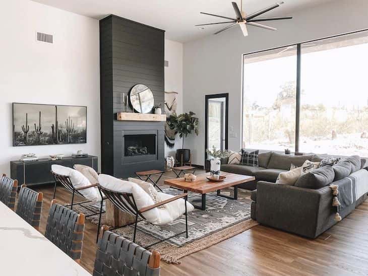 Farmhouse living room with a modern ceiling fan