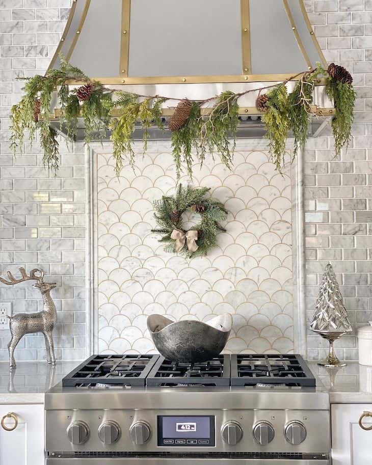 Range hood with Christmas garland - Christmas kitchen decor