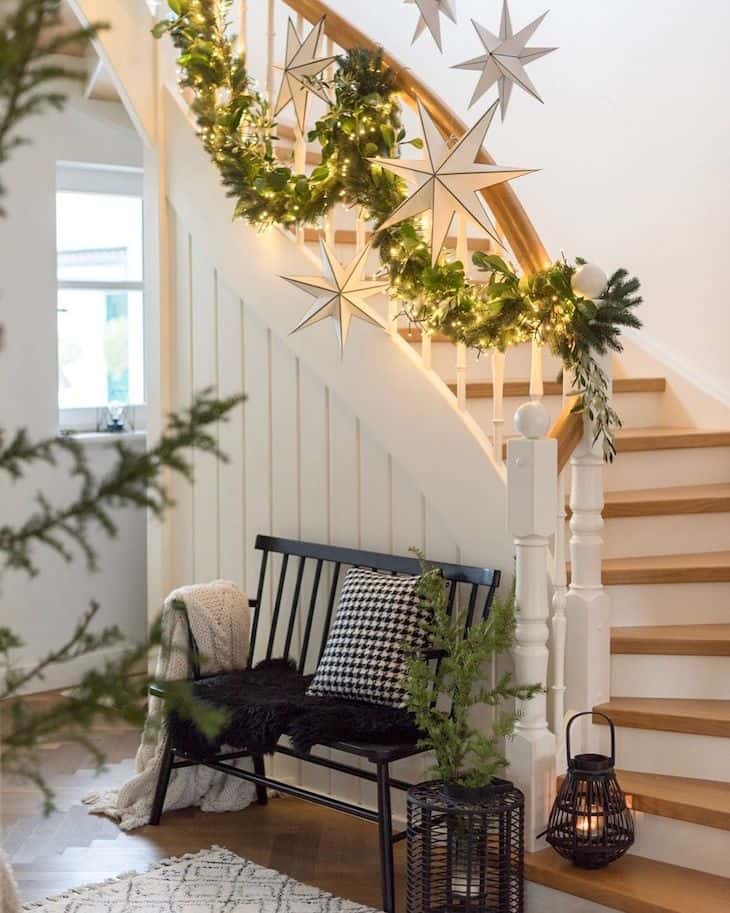 Decorating a Staircase with Honeycomb Balls by The Listed Home