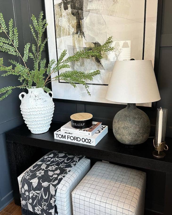 Dark Console Table Styling with Large Art and Greenery