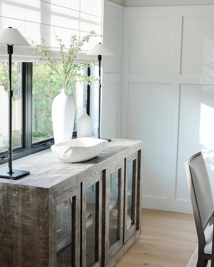 Minimalist Console Table with Rustic Wood and White Vases