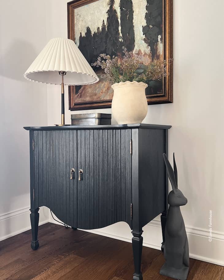 Vintage Console Table Decor with Moody Artwork and Sculptural Pieces