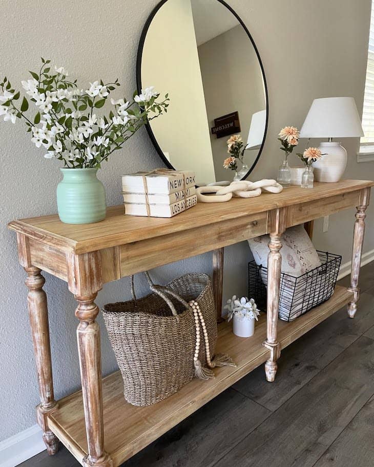 Entryway Console Table with Books, Flowers, and Layered Decor