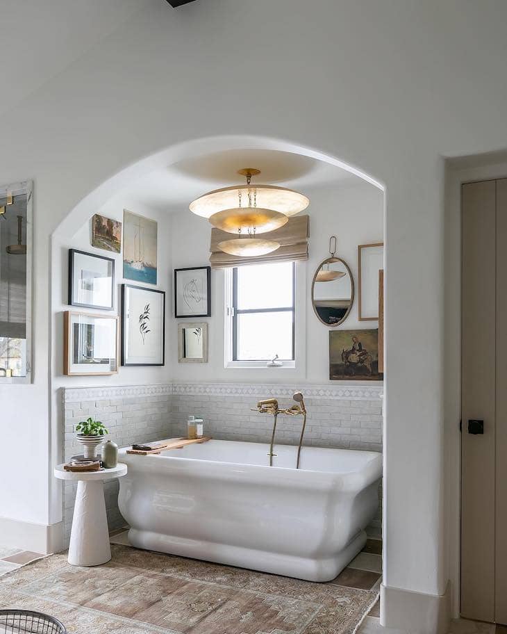 Gallery Wall Above the Bathtub in master bathroom