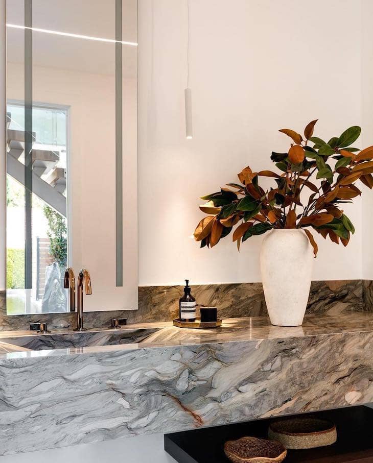 Statement Stone Vanity Design in master bathroom