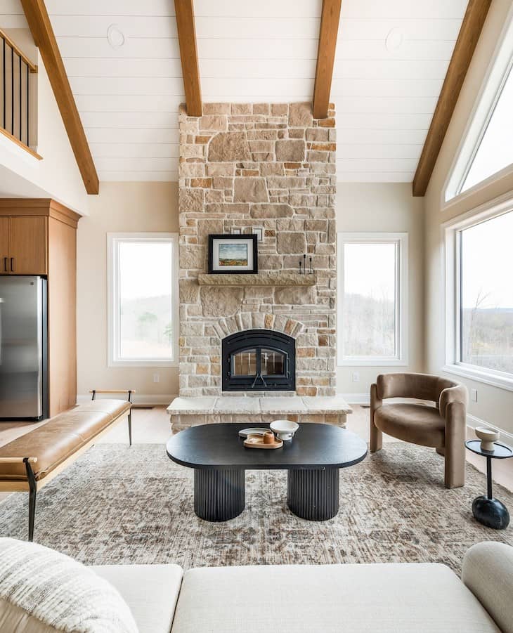 Warm Sandstone Fireplace with Modern Rustic Contrast