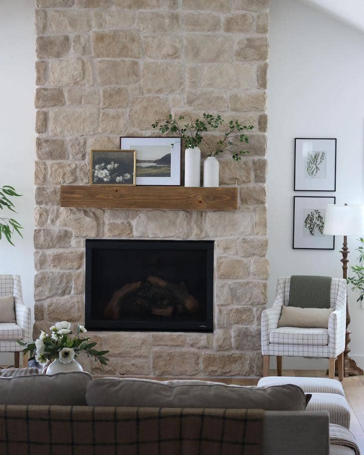 Neutral Ashlar Stone Fireplace with Traditional Charm