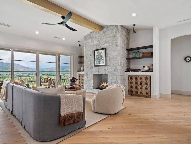 Light Gray Stone Fireplace with Rustic Built-Ins