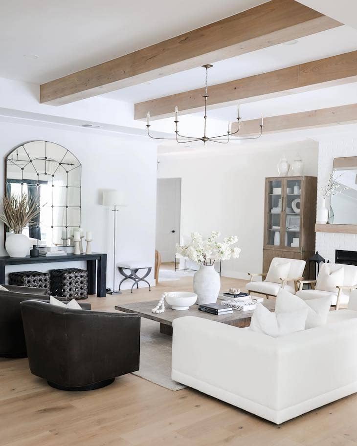 Modern White Living Room with Natural Wood Beams and Neutral Decor