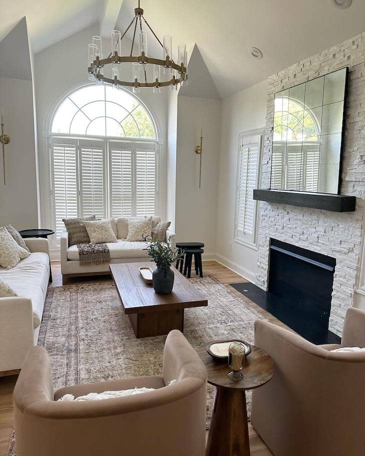 White Living Room with Textured Fireplace and Warm Neutrals