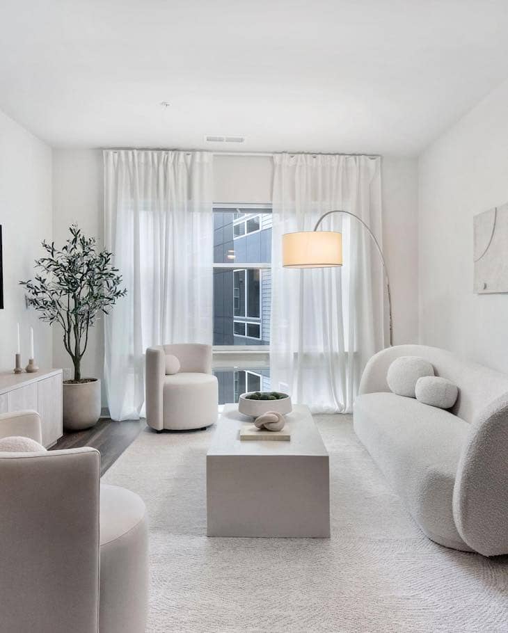 Modern Minimalist White Living Room with Sculptural Furniture