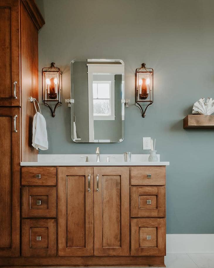 Statement Lighting Beside the Mirror in master bathroom