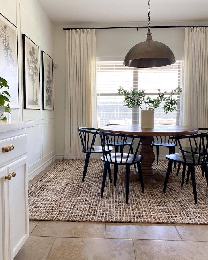 Low-Back Black Spindle Chairs Around a Round Table