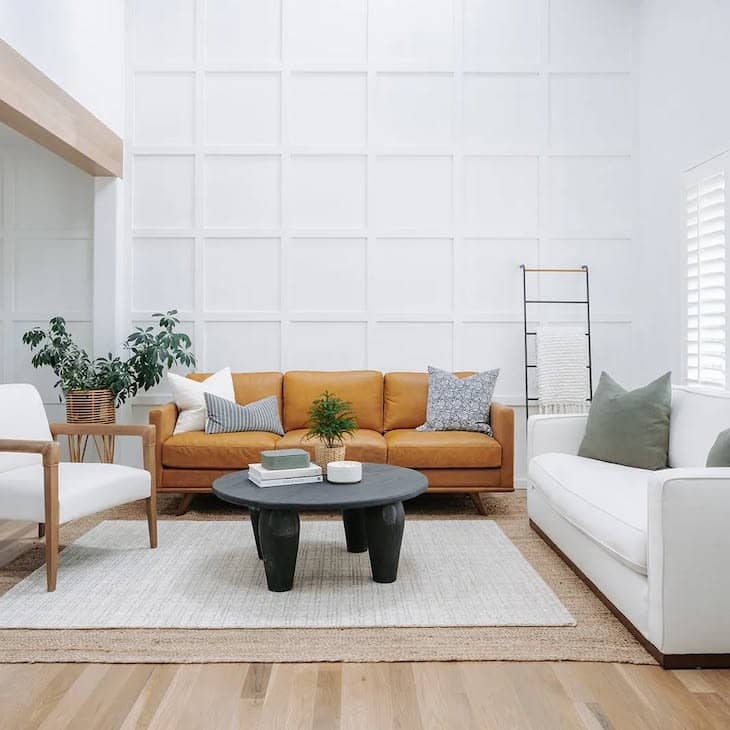 living room with brown leather sofa