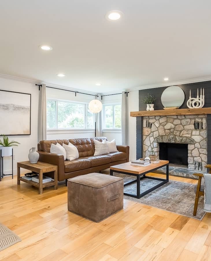 living room with dark brown leather sofa