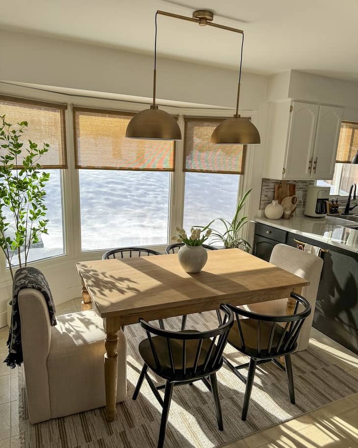 Farmhouse Wood Table With a Mix of Classic and Modern Chairs