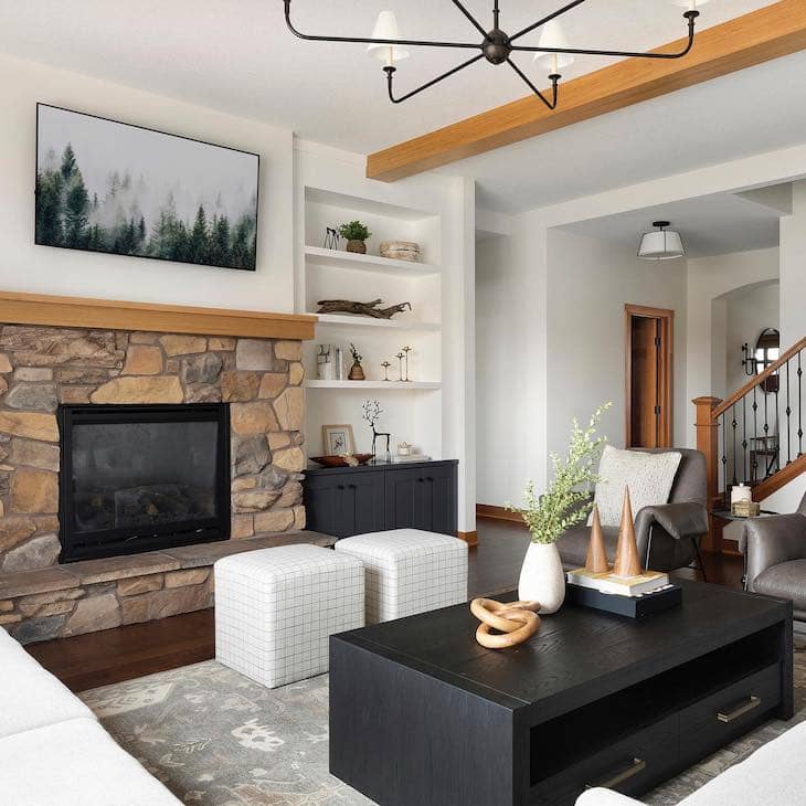 White and Black Built-Ins with Stone Fireplace