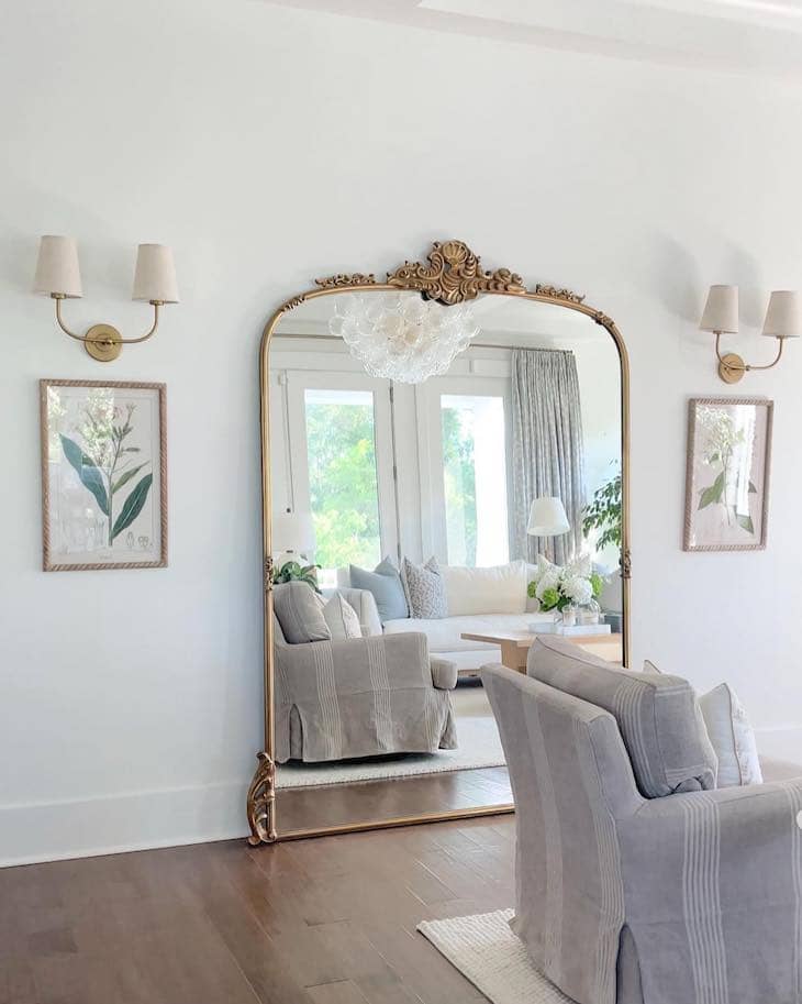 Balanced Artwork Beside a Statement Mirror