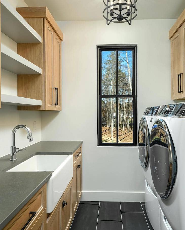 Natural Wood Cabinets for a Bright Laundry Room